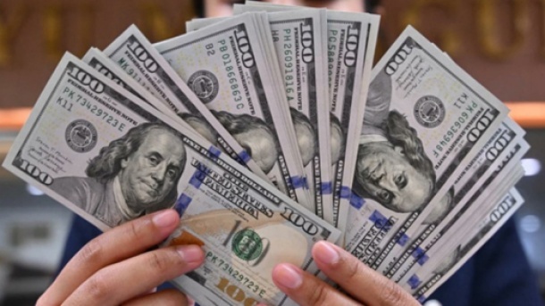 دلار تجاری چند؟