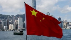 پکن: آمریکا تجارت جهانی را تهدید می‌کند